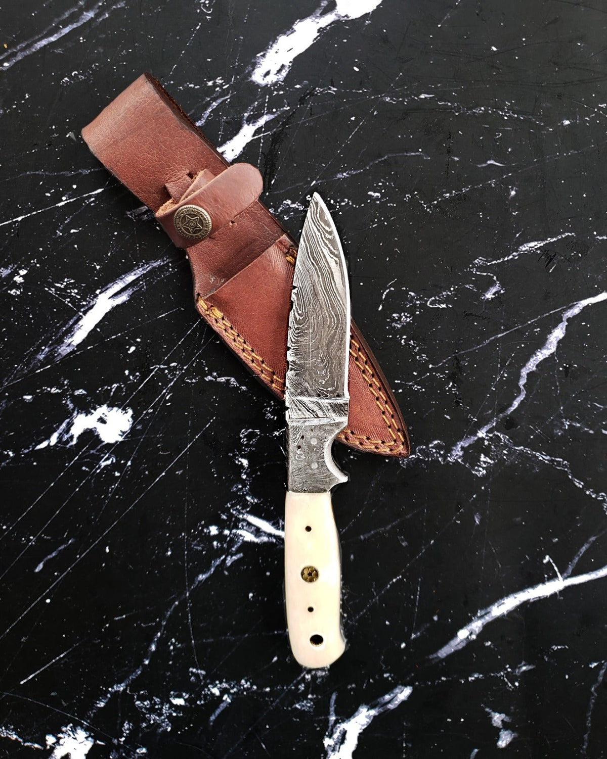 TD-003 Titan knife with Damascus blade and ivory handle in brown leather sheath on Tampa Home & Garden Store
