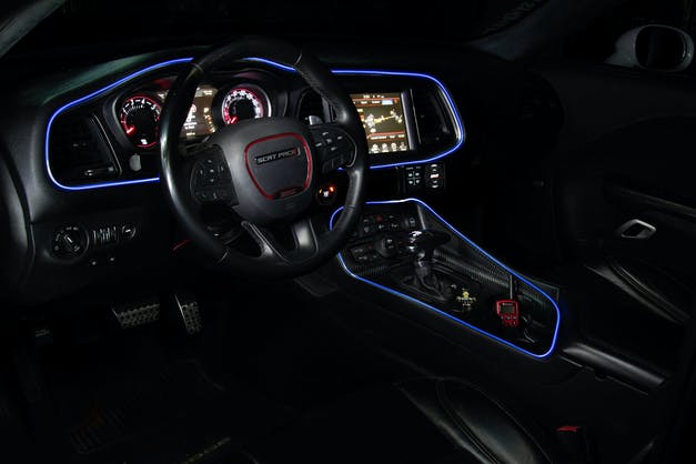 Color-Changing RGB interior dash trim ambient lighting kit with blue LED accents on dash and center console on Tampa Home & Garden Store