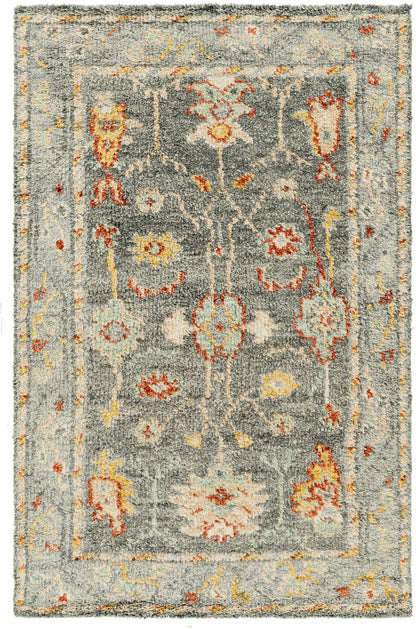 Prosperidad Handmade Wool Rug by Boutique Rugs gray-blue field with faded multicolor floral motifs, plush shag texture on Tampa Home & Garden Store