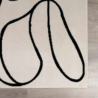 Eilir Modern Low Profile Boho Rug beige with bold black abstract loops Boutique Rugs on Tampa Home & Garden Store