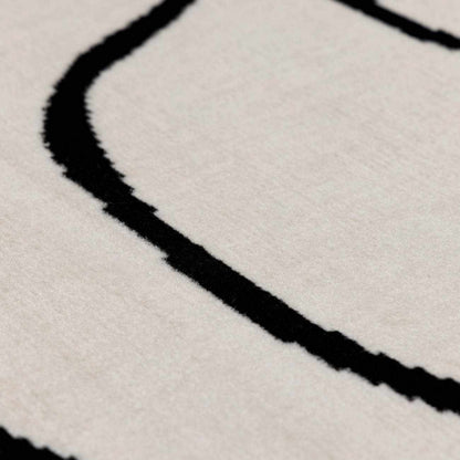 Eilir Modern Low Profile Boho Rug cream rug with bold black line pattern Boutique Rugs on Tampa Home & Garden Store