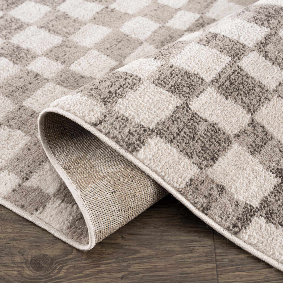 Benjy irregular checkboard beige rug by Boutique Rugs with plush pile on Tampa Home & Garden Store