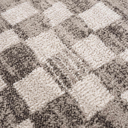 Benjy irregular checkboard beige rug, plush shag texture in beige tones on Tampa Home & Garden Store