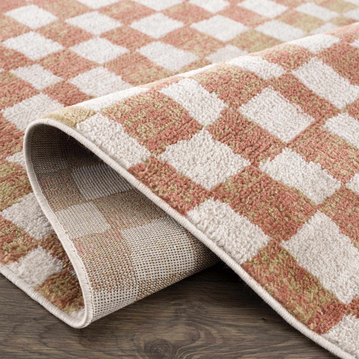 Benjy Irregular Checkboard Rug in cream and salmon colors by Boutique Rugs on Tampa Home & Garden Store