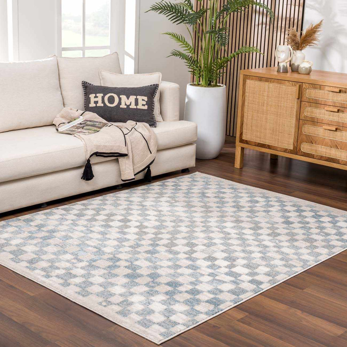 Benjy Cream & Light Blue Checkered Area Rug with cream and blue checks in a bright living room on Tampa Home & Garden Store