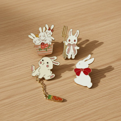 Kawaii Bunny Enamel Pin Set of 4 – Shaketea lapel pins with white bunnies and basket on wood on Tampa Home & Garden Store