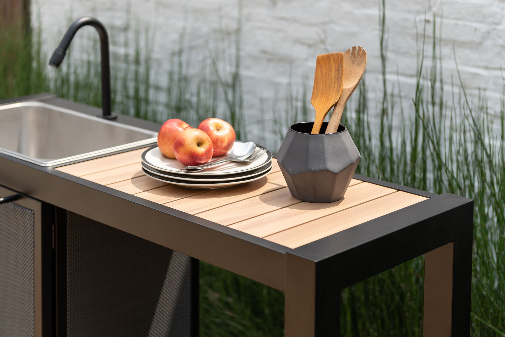 Panama Dark Outdoor Kitchen by LifestyleGarden US on wood countertop with sink and apples on Tampa Home & Garden Store