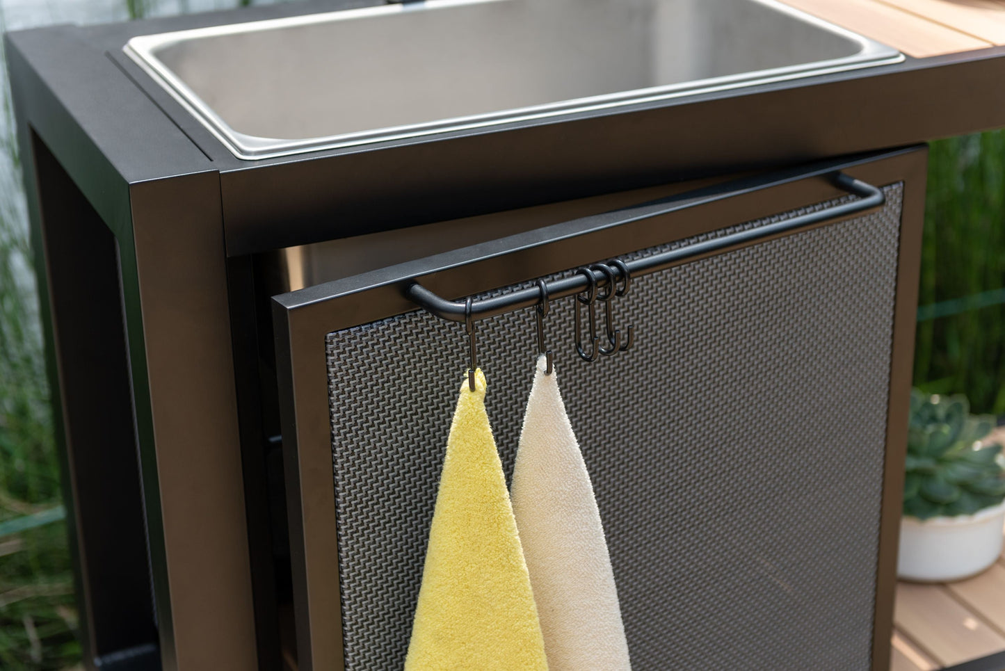 Panama Dark Outdoor Kitchen dark brown frame with woven panel and stainless sink towel hooks on Tampa Home & Garden Store