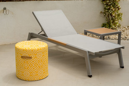 Panama Light Sun Lounger with gray frame and light mesh, wood-slat side table nearby on Tampa Home & Garden Store