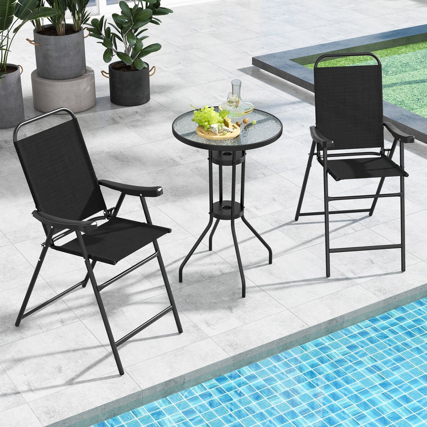 folding patio bar stool set of 2 in black with footrests beside a glass round table by the pool on Tampa Home & Garden Store