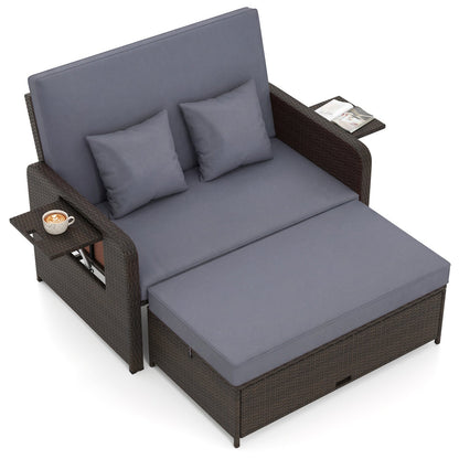 Outdoor rattan daybed with adjustable backrest and ottoman, blue-gray cushions on Tampa Home & Garden Store