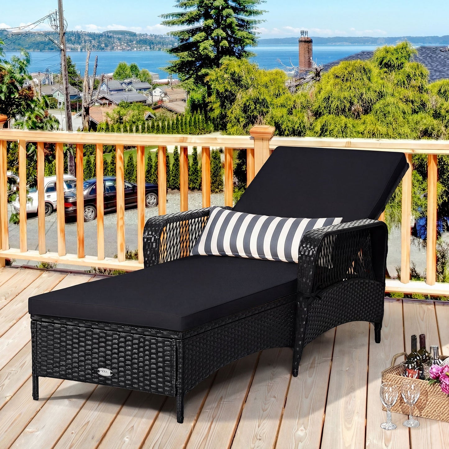 Patio wicker sunlounger with adjustable backrest and black cushion striped pillow on Tampa Home & Garden Store