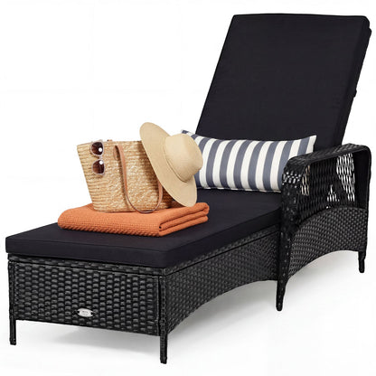 Patio wicker chaise lounge with black cushion and adjustable backrest; striped pillow on Tampa Home & Garden Store