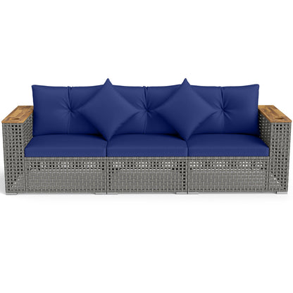 Patio wicker sectional with navy cushions and wood-top tables, 1 armless 2 corner sofas on Tampa Home & Garden Store