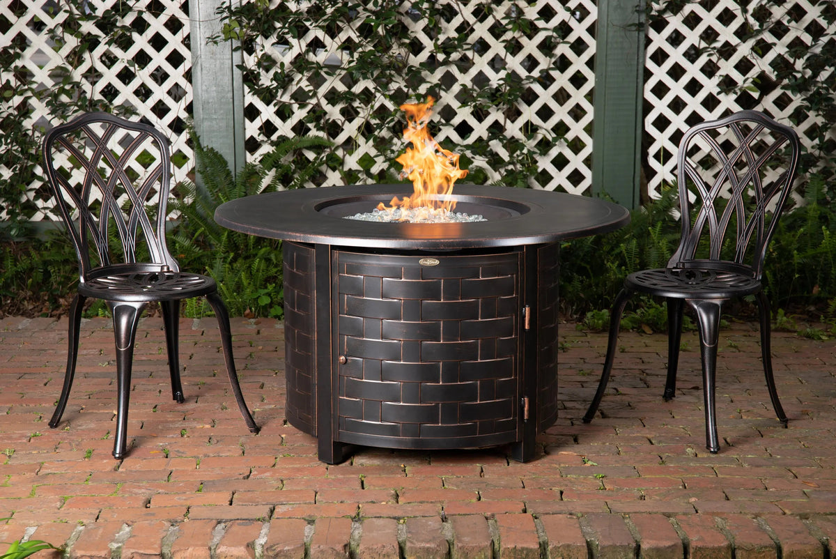 Perissa Woven Aluminum LPG Gas Fire Pit round outdoor fireplace dark bronze with glass rocks on Tampa Home & Garden Store