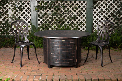 Perissa Woven Aluminum LPG Fire Pit, round dark bronze gas pit table with brick weave; two chairs on Tampa Home & Garden Store