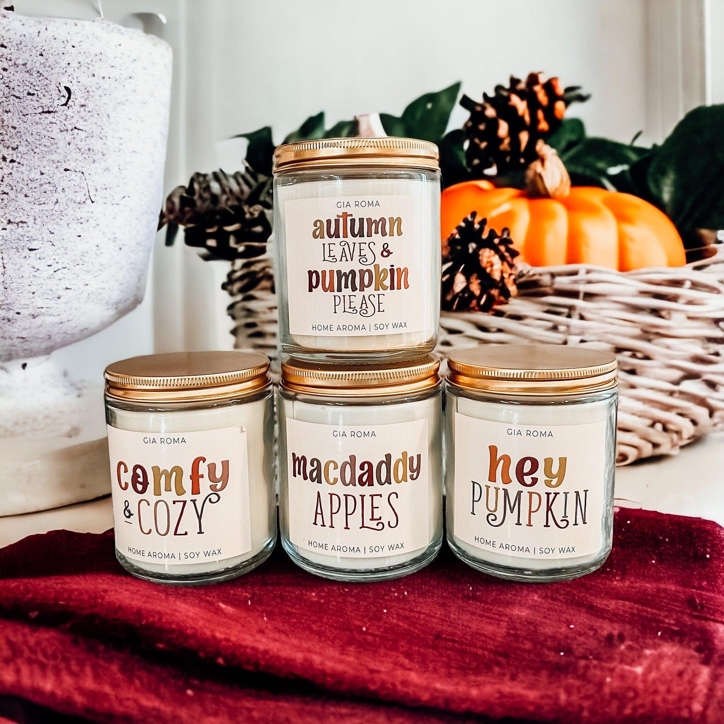 Mac Apple Candle Gia Roma in clear jar with copper lid among autumn decor pumpkins on Tampa Home & Garden Store