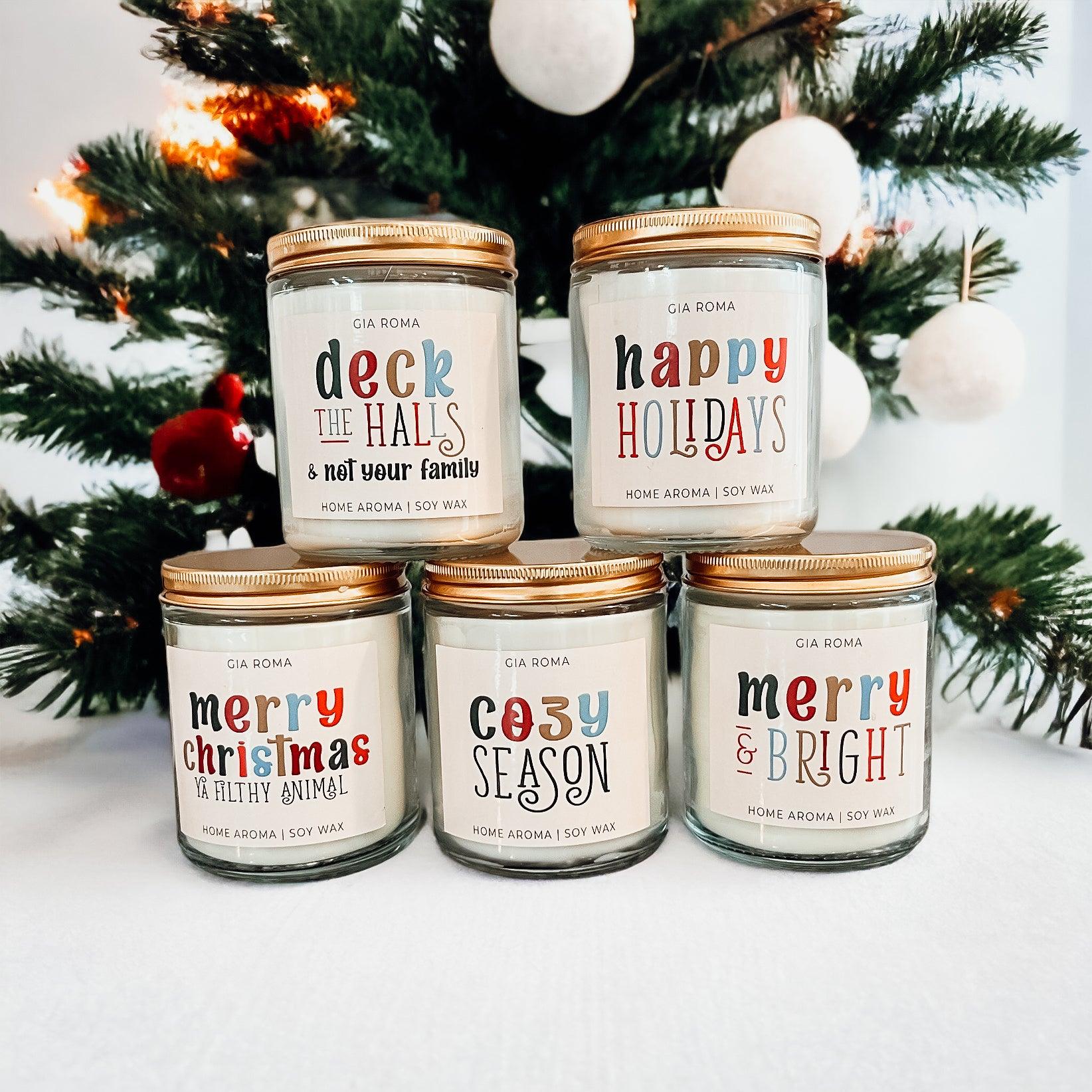 Deck The Halls candle by Gia Roma in a glass jar with copper lid; soy wax, festive display on Tampa Home & Garden Store