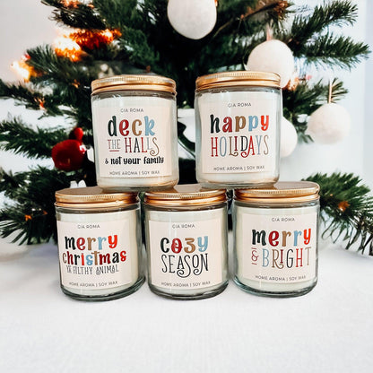 Deck The Halls candle by Gia Roma in a glass jar with copper lid; soy wax, festive display on Tampa Home & Garden Store