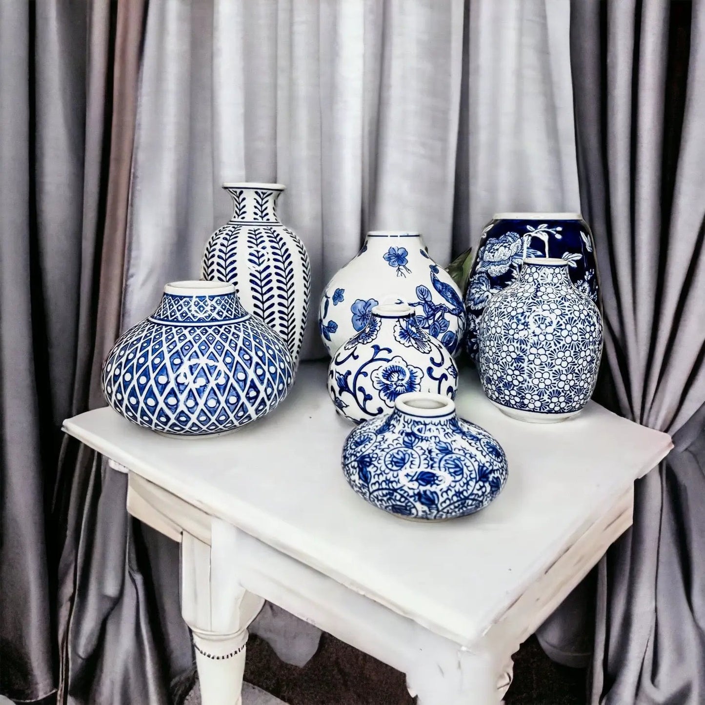 Samira Blue Porcelain Vases by Gia Roma, blue-and-white ceramic vases on a white table on Tampa Home & Garden Store