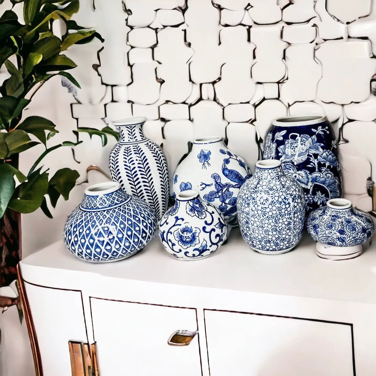 Samira blue porcelain vases Gia Roma in blue and white with floral patterns on white cabinet on Tampa Home & Garden Store