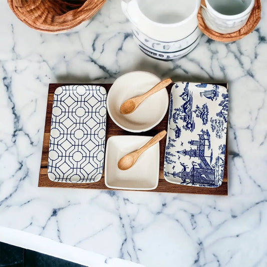 Chinoiserie tapas serving set by Gia Roma with blue-and-white trays, beige bowl and wooden spoons on Tampa Home & Garden Store