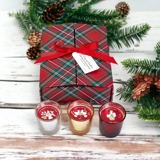 Gia Roma Advent Candle Set in plaid red gift box with ribbon; three numbered tin candles on Tampa Home & Garden Store