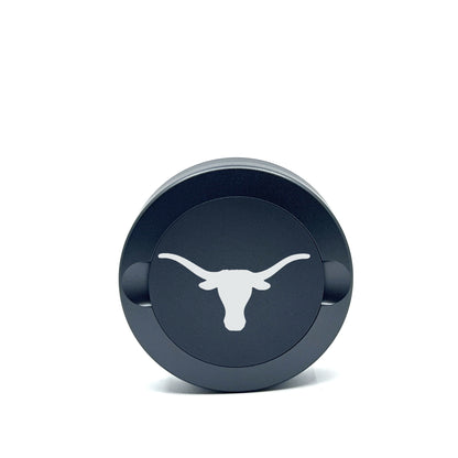 Texas Longhorns metal nicotine pouch cans lid in dark blue with white longhorn emblem on Tampa Home & Garden Store