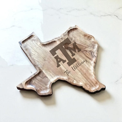 Texas-shaped wooden serving tray with natural grain and A&M logo on Tampa Home & Garden Store