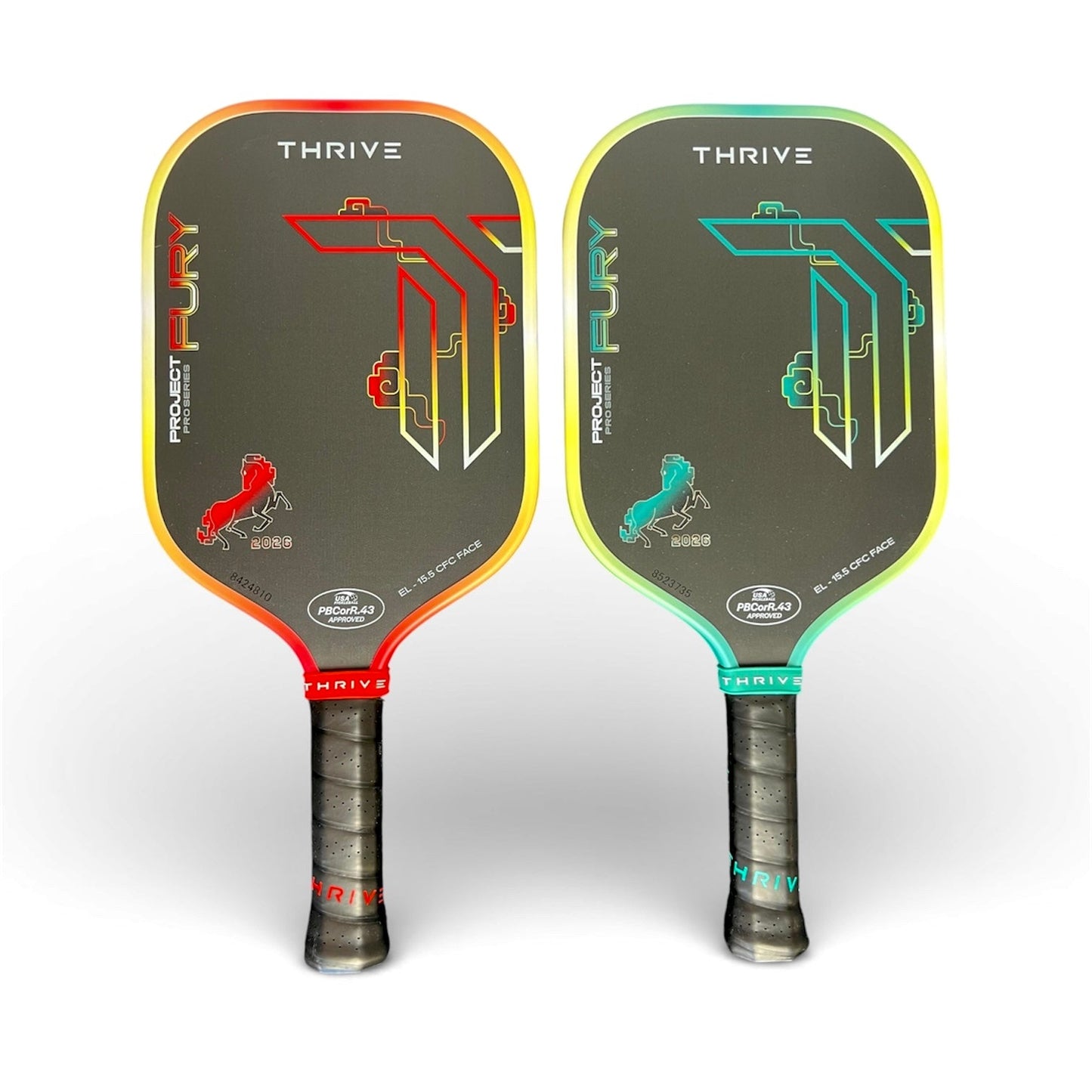Thrive Fury EL 15.5 mm pickleball paddles pair with neon red-orange and teal-green edge accents on Tampa Home & Garden Store