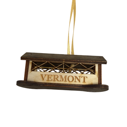 Wooden 3D Vermont covered bridge ornament in brown wood with lattice detailing on Tampa Home & Garden Store