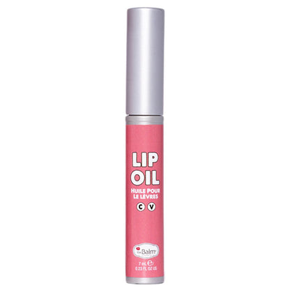 theBalm Little Red Corvette Lip Oil pink tube with silver cap; theBalm logo visible on tube on Tampa Home & Garden Store