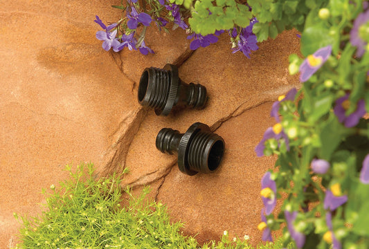 Orbit Irrigation plastic male quick-connect hose ends, 2-pack, black fittings on stone wall on Tampa Home & Garden Store
