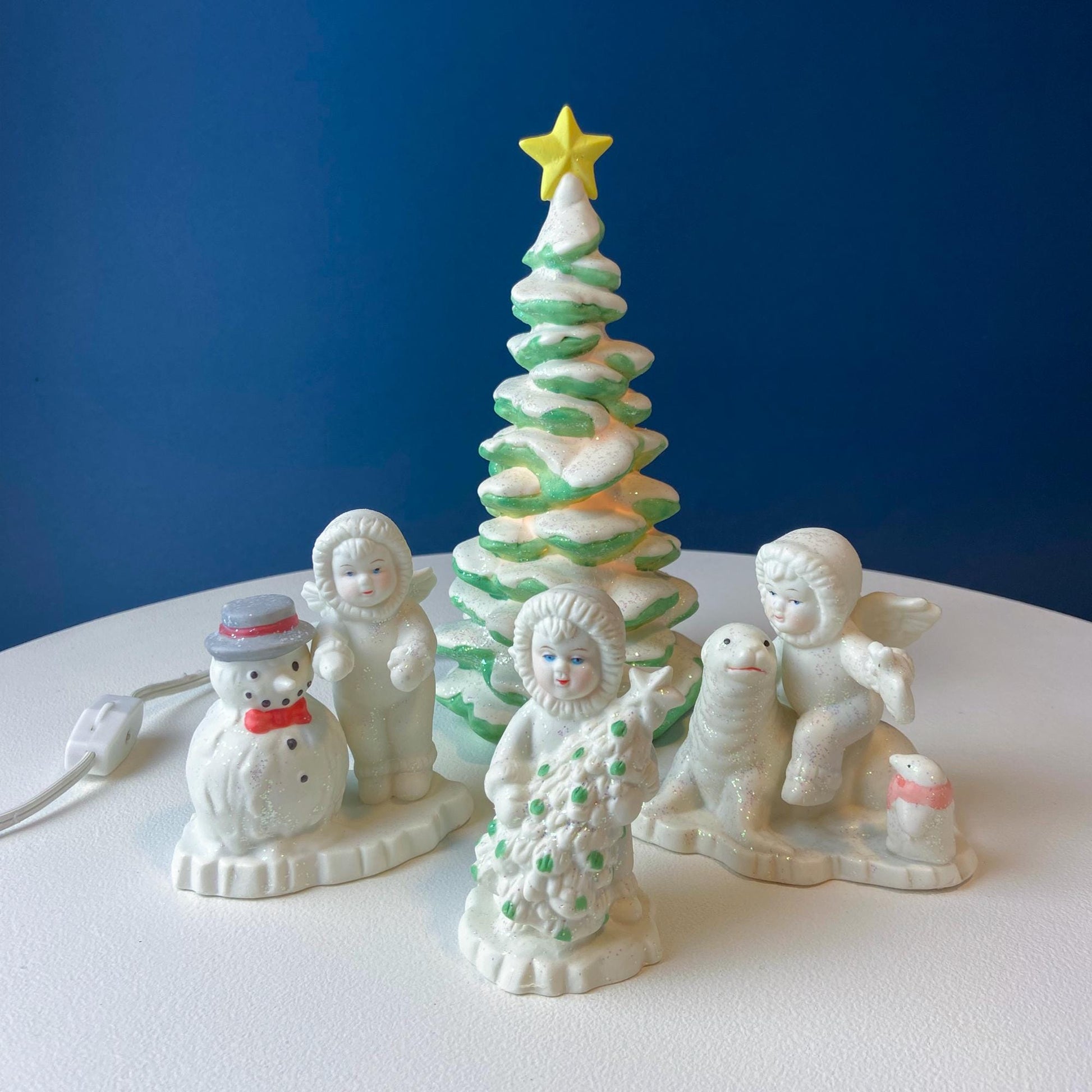 Polar Pals Playing in Snow Under Lit Christmas Tree. 3 White Porcelain Cupid Figurines Celebrating Friendship. Kids Room. Night Light. - Tampa Home & Garden Store