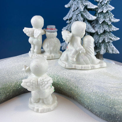 Polar Pals Playing in Snow Under Lit Christmas Tree. 3 White Porcelain Cupid Figurines Celebrating Friendship. Kids Room. Night Light. - Tampa Home & Garden Store
