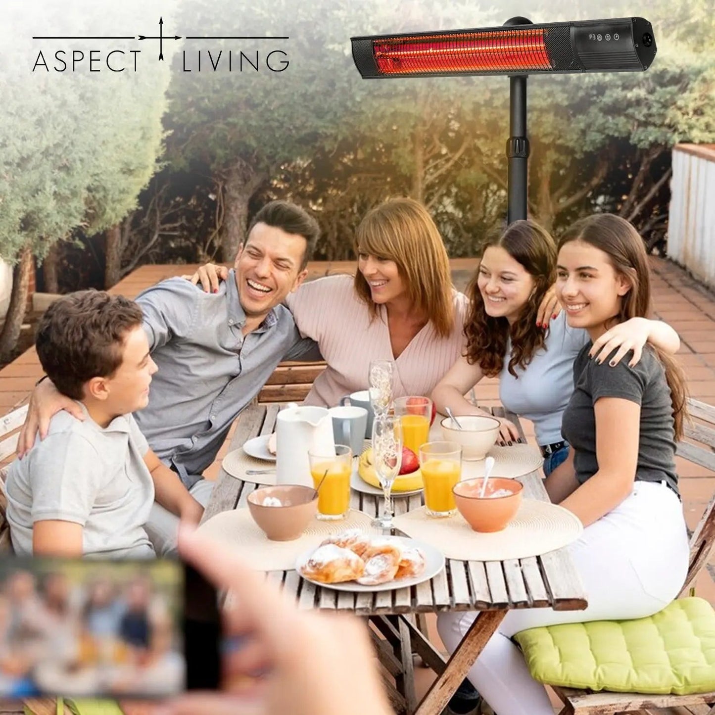 Pole Mounted Electric Patio Heater by Fire Sense/Balkene Home black with red glow over table on Tampa Home & Garden Store