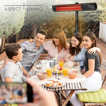 Pole Mounted Electric Patio Heater by Fire Sense/Balkene Home black with red glow over table on Tampa Home & Garden Store