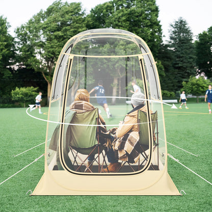 GemGear instant pop-up sports tent beige with clear mesh panels and two chairs on a grassy field on Tampa Home & Garden Store