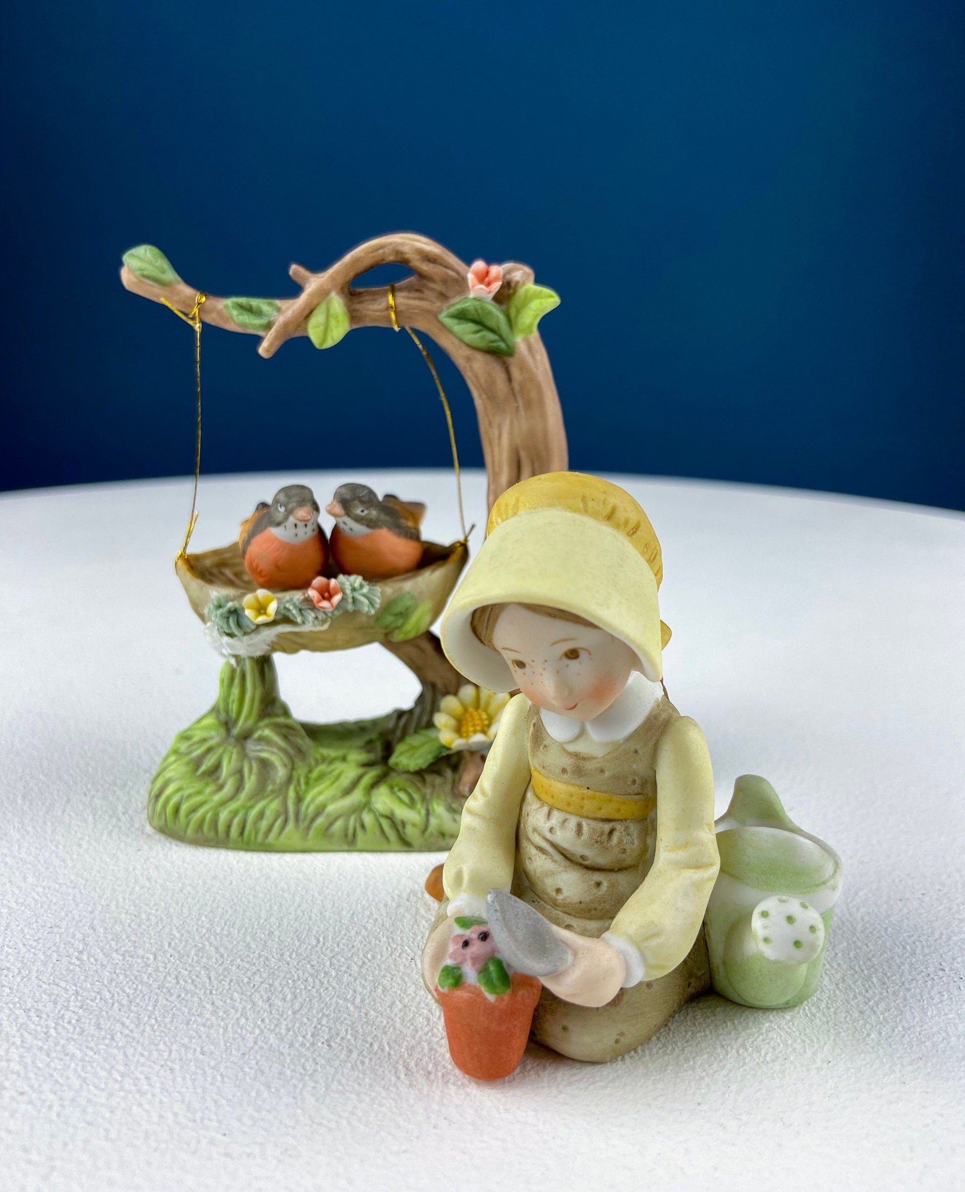 Porcelain Figurine by Marks & Rosenfeld of Little Girl Planting Flowers. Paired with Porcelain Birds in Nest. Gift for Mom, Grandma, Partner - Tampa Home & Garden Store