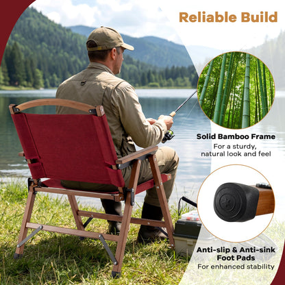 Portable red folding camping chair by GemGear with wooden arms by a lakeside on Tampa Home & Garden Store