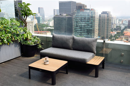 Portals Dark 2-Seat Outdoor Sofa with grey cushions and black frame on rooftop patio on Tampa Home & Garden Store