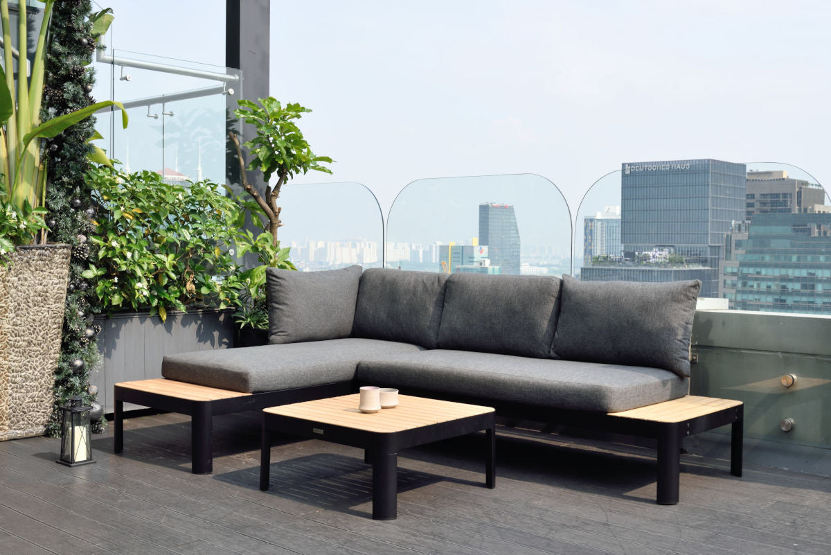 Portals Dark 2-Seat Outdoor Sofa by LifestyleGarden US with charcoal cushions on rooftop on Tampa Home & Garden Store
