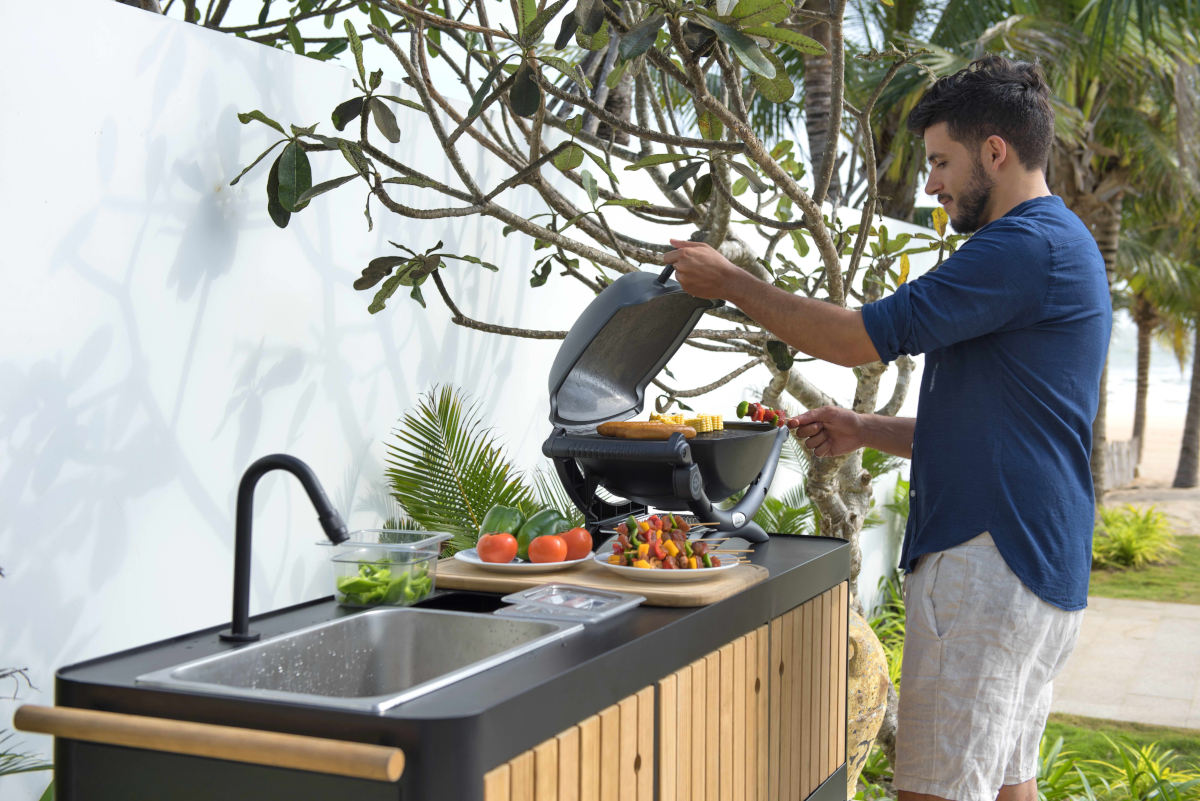 Portals Dark Outdoor Kitchen outdoor island with built-in sink, grill, wooden panels on Tampa Home & Garden Store