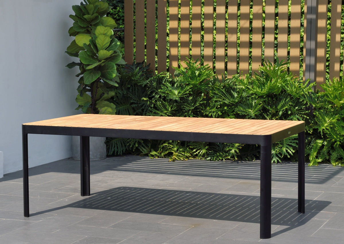 Portals rectangular outdoor dining table with wooden top and black legs by LifestyleGarden on Tampa Home & Garden Store