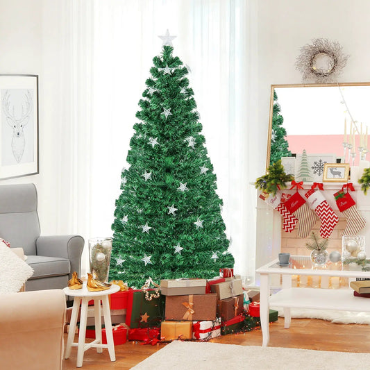 Tall artificial Christmas tree with white star ornaments in a cozy living room with gifts on Tampa Home & Garden Store