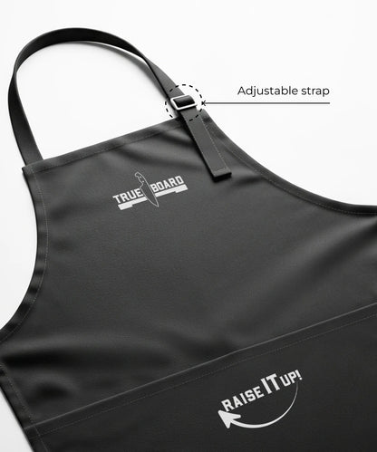 True Board Apron by The True Board in black with adjustable buckle strap, logo visible on Tampa Home & Garden Store