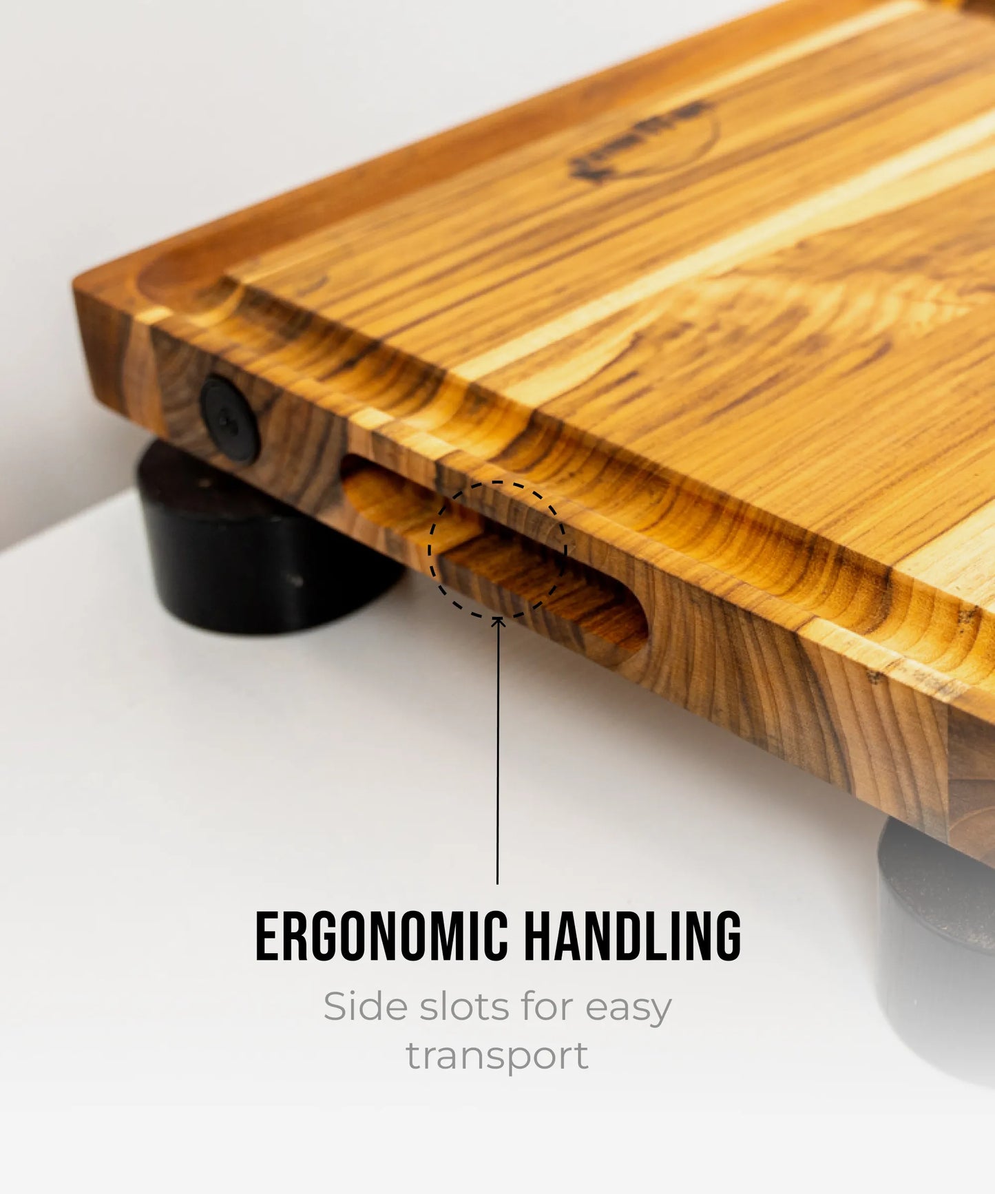 The True Board Compact wooden cutting board with ergonomic design and side transport slots on Tampa Home & Garden Store