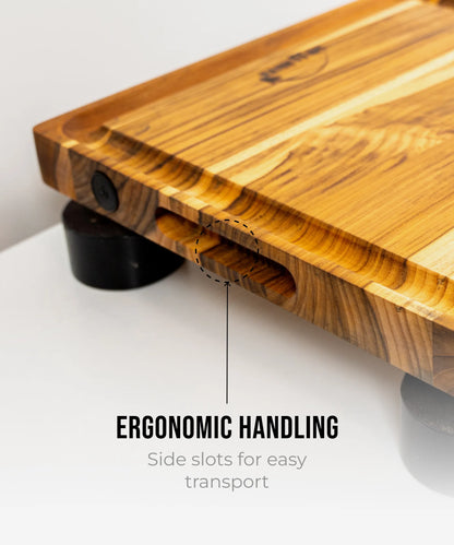 The True Board Compact wooden cutting board with ergonomic design and side transport slots on Tampa Home & Garden Store