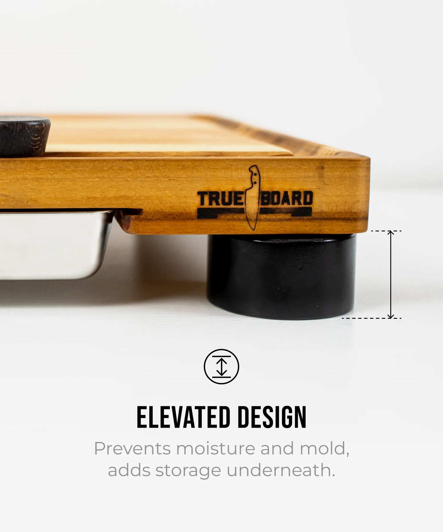 The True Board Compact cutting board in natural wood on elevated black legs on Tampa Home & Garden Store