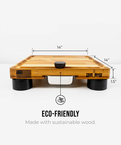 The True Board Compact cutting board in natural wood with black feet, 14x14 in on Tampa Home & Garden Store